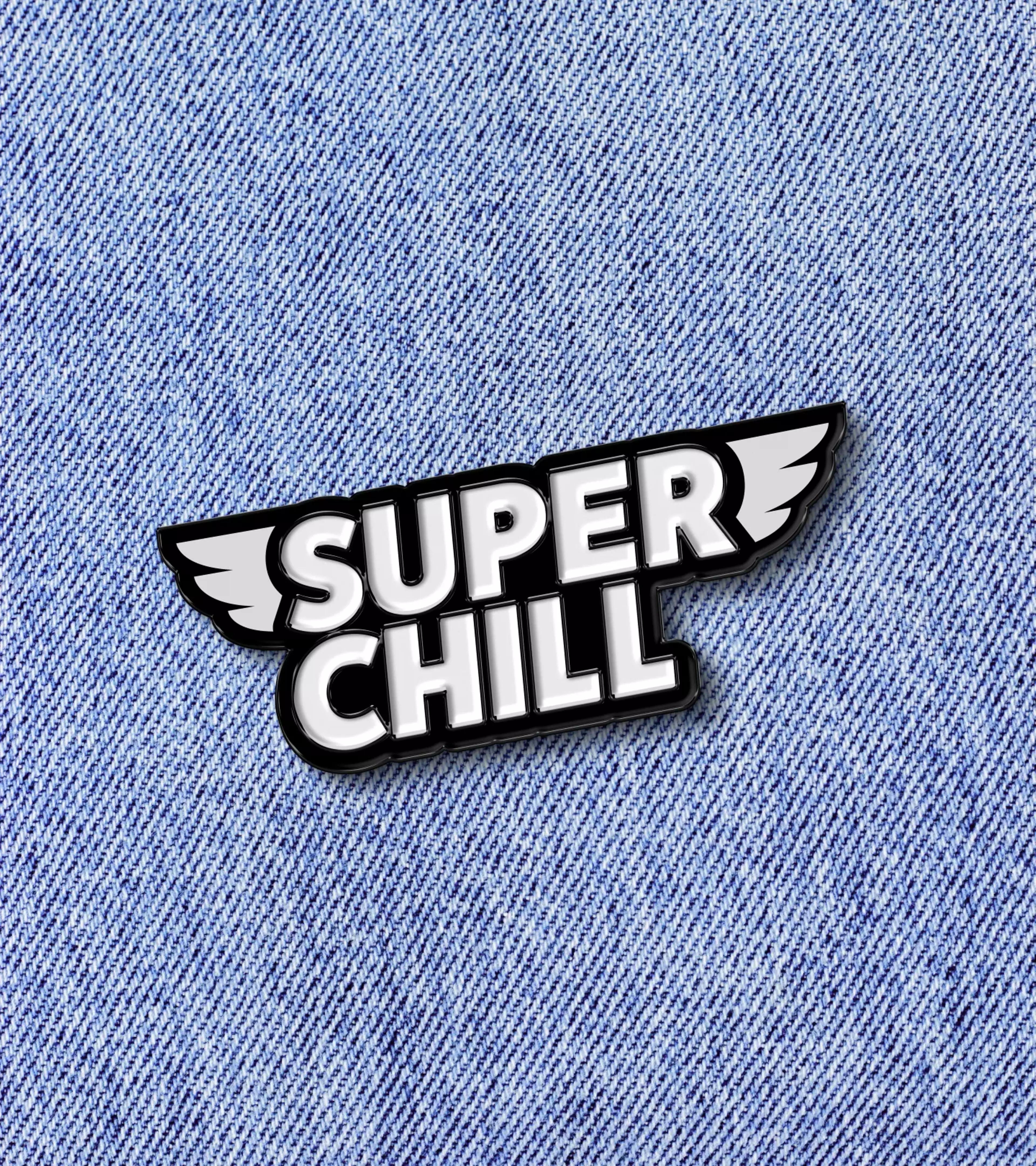 A badge with wings printed on a light and blue jeans