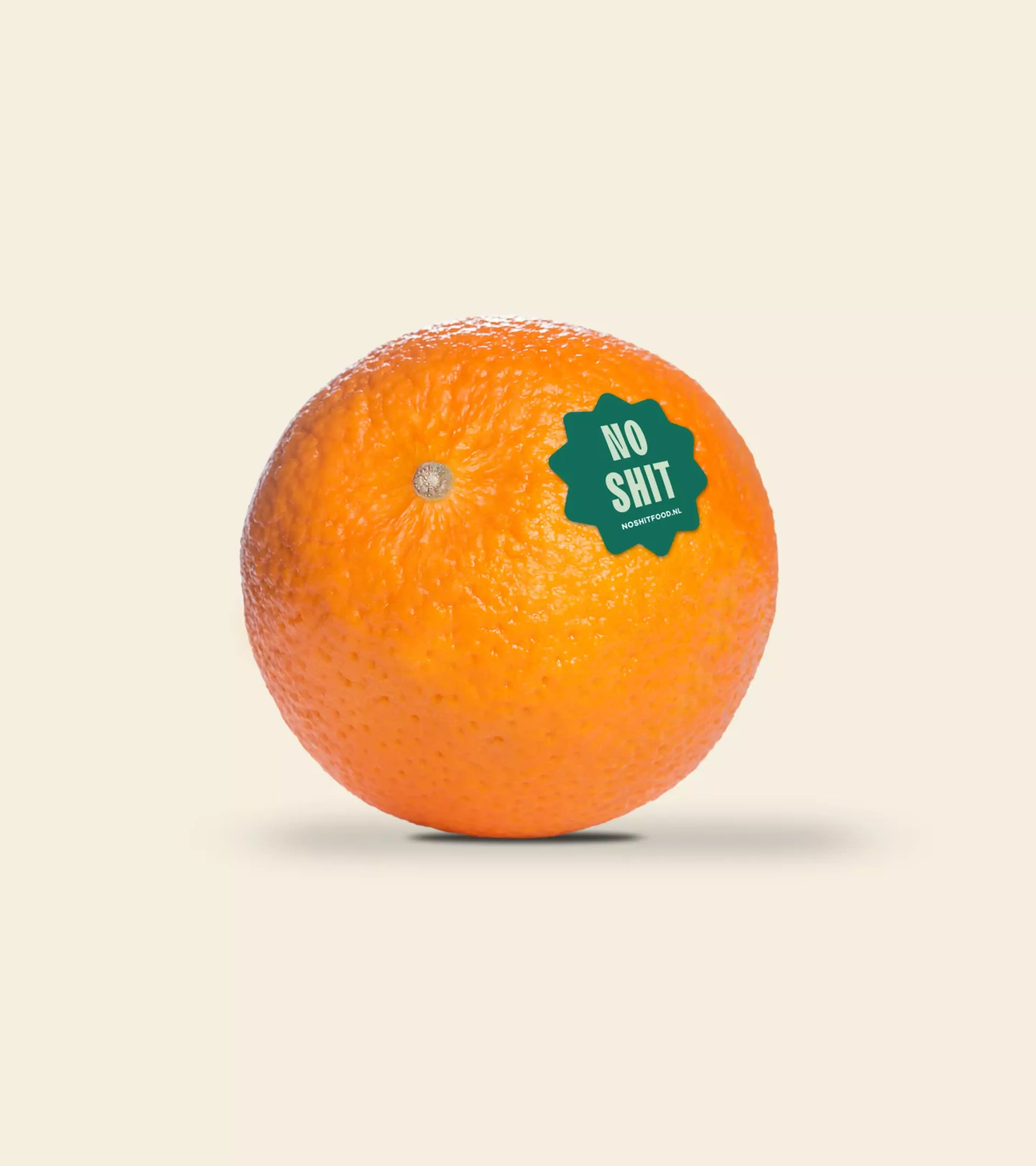 A beige background with an orange and a green sticker on it