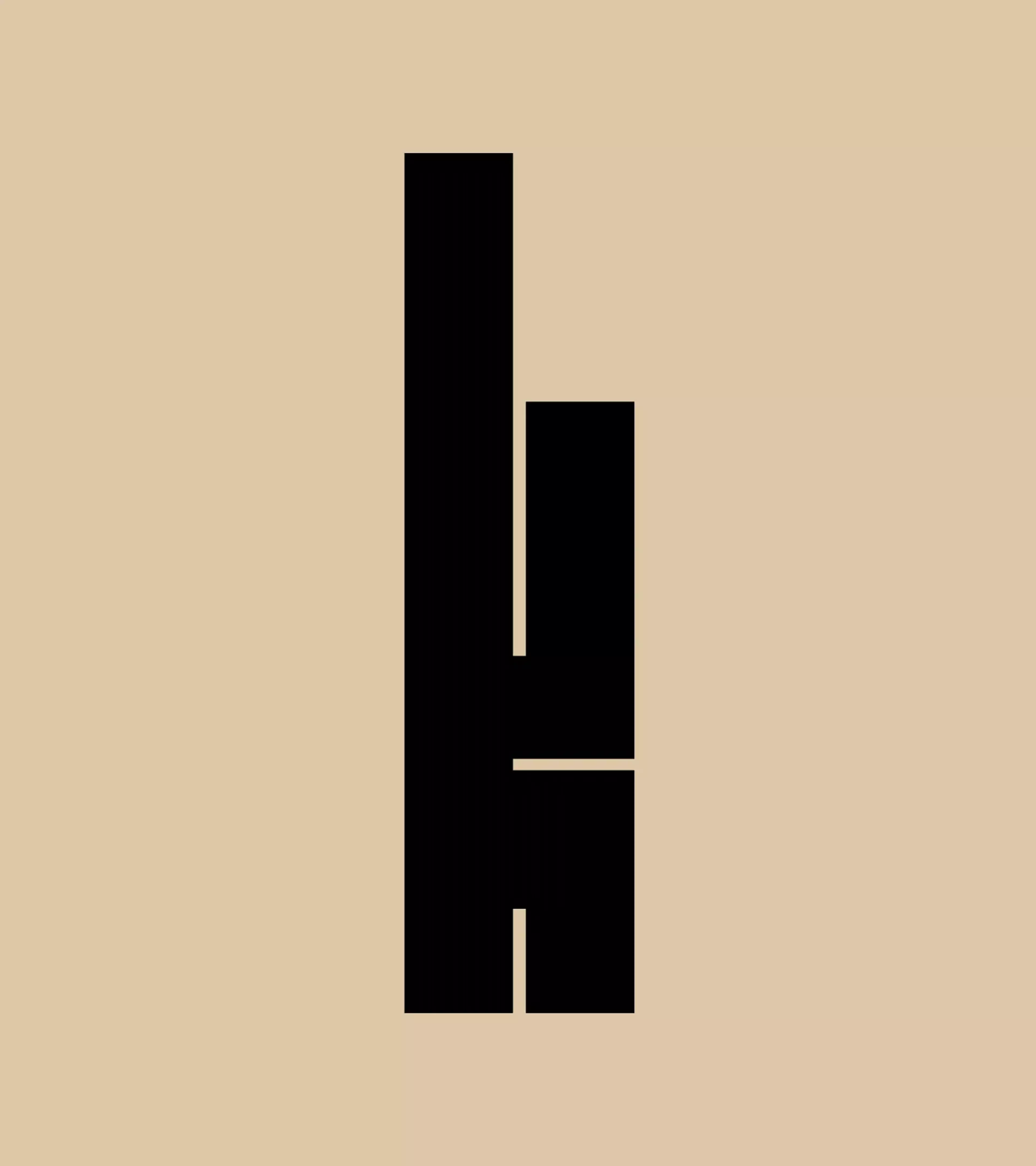 The letter K in a black color on a beige background