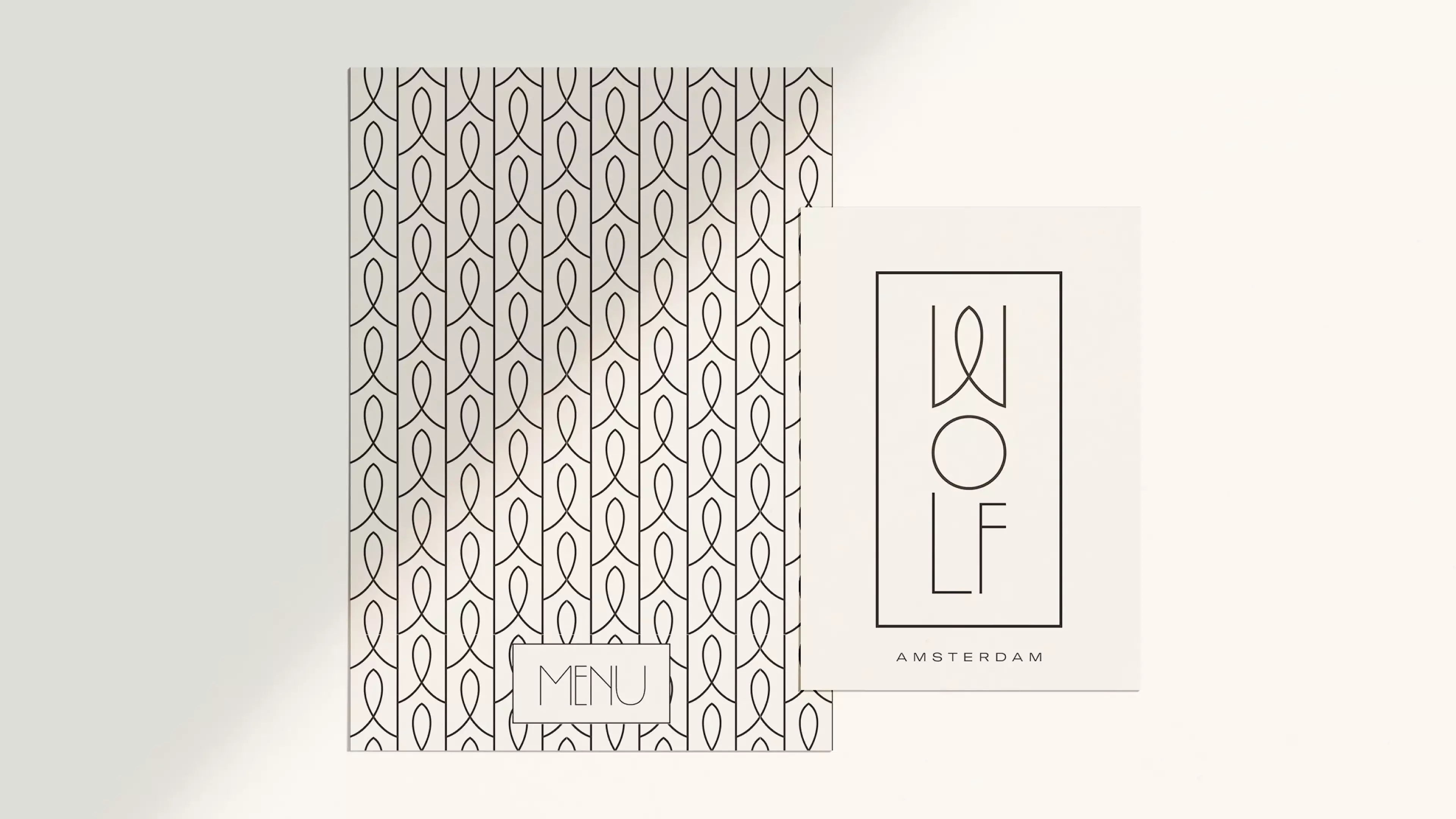 A menu card with a pattern including a business card in the foreground