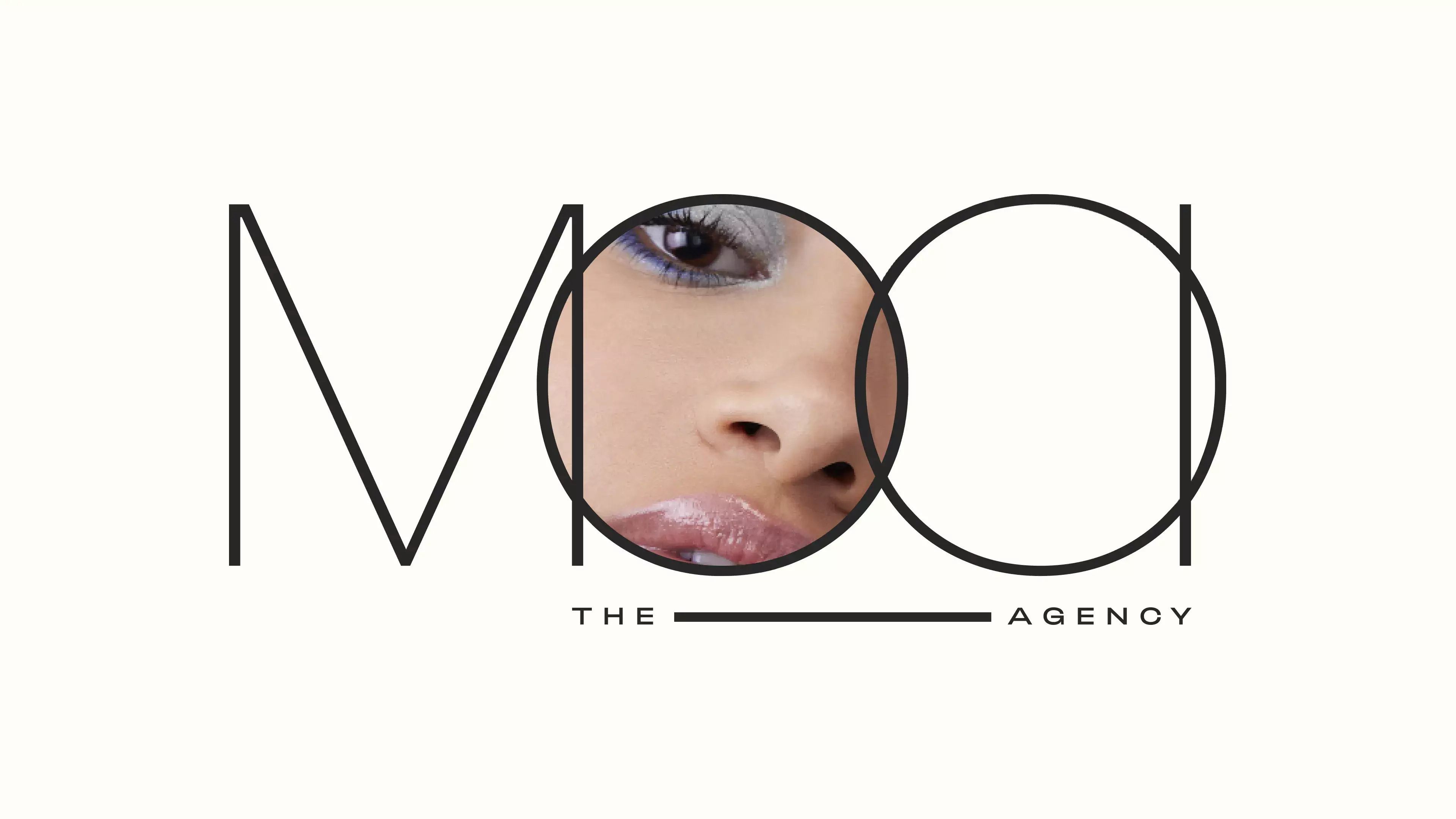 A gif of the MOOI the Agency logo with an image of a woman in the first letter O of the logo